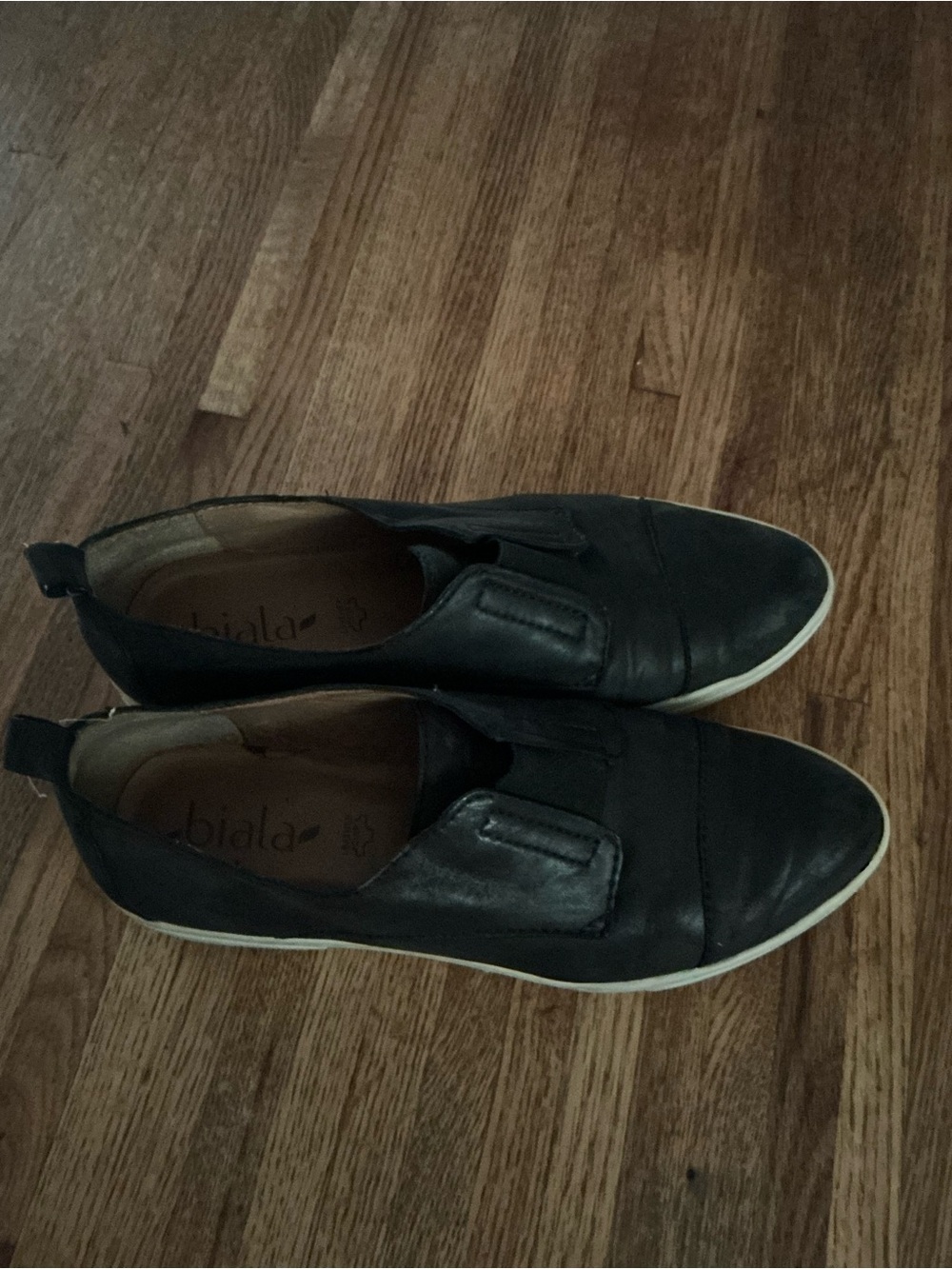 Black Slip-On Athletic Sneakers by Biala